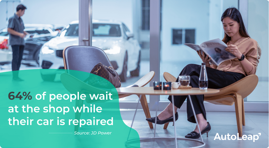 A woman reading a magazine at a repair shop